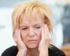 Careworn - (tired and unhappy because of prolonged worry) चिन्तित/परेशान