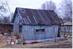 Rickety  - (Poorly made and likely to collapse.)