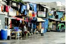 Squalor - (The state of being extremely dirty and unpleasant, especially as a result of poverty or neglect.)
