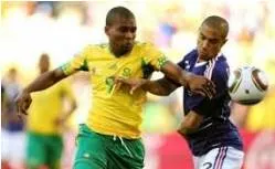 Jostle  - (Push, elbow, or bump against (someone) roughly, typically in a crowd.)
