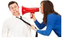 Vociferously  - (Expressing or characterized by vehement opinions; loud and forceful.)