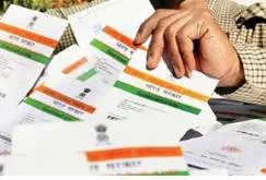 Aadhaar  india should take steps to ensure privacy in biometric identification programmes  says imf
