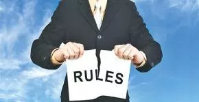 Flout  - To intentionally not obey a rule, law, or custom: