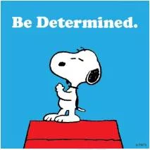 Doggedly  - In a very determined way to do something, even if it is very difficult: