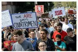 Take to the streets  - To rampage or riot.