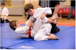 Skirmish  - A brief and usually  unplanned fight during a war or a brief argument or disagreement.
