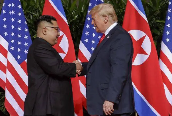Historic handshake — on trump kim summit