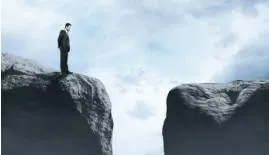 Chasm  - A deep opening in the earth's surface or a large difference between two opinions or groups of people: