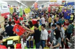 Bustling - If a place is bustling, it is full of busy activity.
