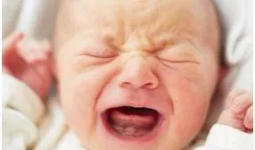 Strident  - Sound that is loud, unpleasant, and rough.