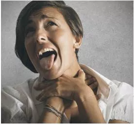 Stifling  - (of heat, air, or a room) very hot and causing difficulties in breathing.