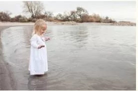 Wade  - Walk With Effort Through Water Or Another Liquid Or Viscous Substance.