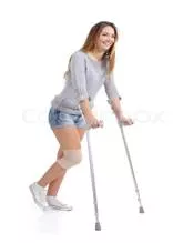 Hobble  - Walk in an awkward way, typically because of pain from an injury.
