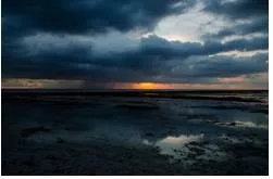 Portent  - A sign or warning that a momentous or calamitous event is likely to happen.