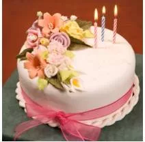 Embellish  - Make (something) more attractive by the addition of decorative details or features.
