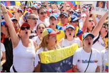 Clamor  - A loud and confused noise, especially that of people shouting.