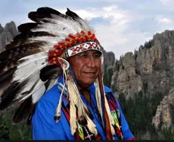 Indigenous  - Belonging to a particular place by birth or origin.