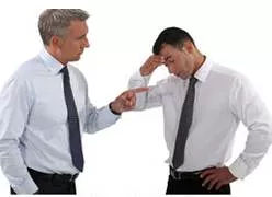 Drag over the coals - To scold someone severely for an error or mistake.