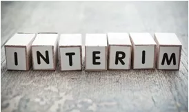 Interim  - Serving in a position for the time being.