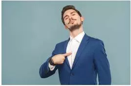 Overweening  - Having too high an opinion of oneself.