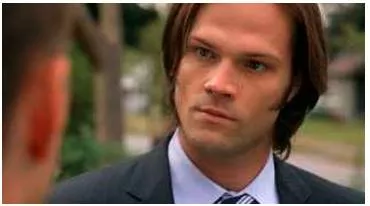 Glare  - Meaning: oppressive public attention; a fierce or angry stare;