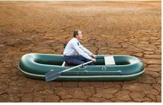 Stagnant  - Meaning: showing no activity; dull and sluggish.