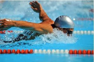 Vigorously  - Meaning: in a way that involves physical strength, effort, or energy.