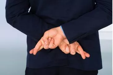 Devious  - Meaning: Behaving in a dishonest or indirect way, or tricking people, in order to get something.