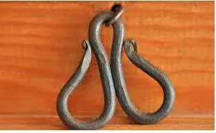 Wrought  - Meaning- Made or fashioned in the specified way.