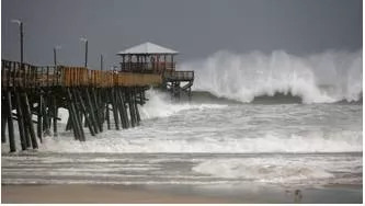 Surge  - A sudden large increase, typically a temporary one.