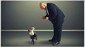Browbeat  - Intimidate (someone), typically into doing something, with stern or abusive words.