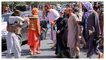 Ode to her courage  the afghan woman standing up to talib’s gun