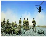 Joe biden slips with his soldiers