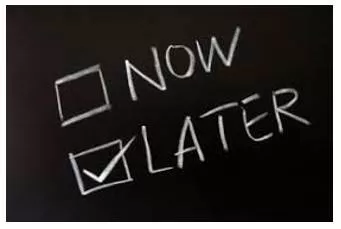 Back-Burner  - Postpone consideration of or action on.