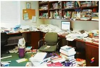 Disarray  - A state of disorganization or untidiness.