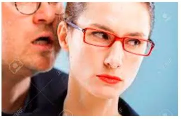 Murmur  - The quiet or subdued expression of a particular feeling by a group of people.