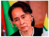 Cuffed and collared  on imprisonment to suu kyi