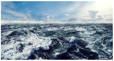Choppy  - (of a sea, lake, or river) having many small waves.