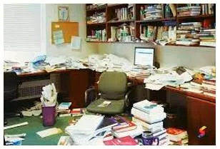 Disarray  - A state of disorganization or untidiness.
