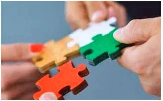 Piecemeal  - Done or happening gradually at different times and often in different ways, rather than carefully planned at the beginning.