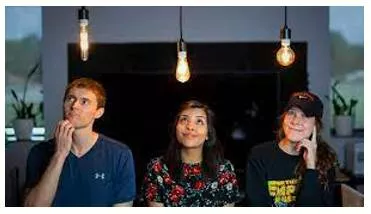 Deftly - In a way that is neatly skilful and quick in movement.
