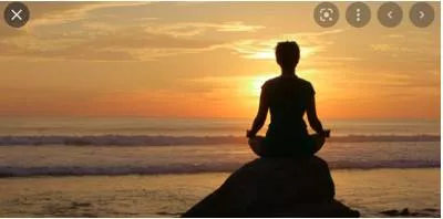 Serenely - In a calm and peaceful way.