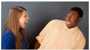 Flinch - To make a sudden movement with your face or body as a result of pain, fear, surprise, etc.