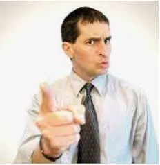Reproachful  - Expressing blame or criticism.