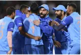 India pips bangladesh in tense finish  inches closer to a semifinal spot