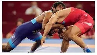 Grapple  - To try hard to find a solution to a problem.
