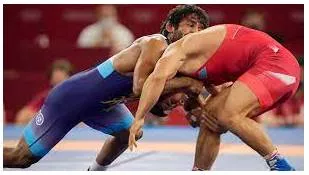 Grapple - To try hard to find a solution to a problem.