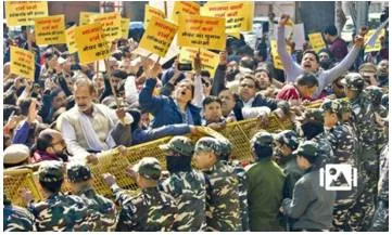 Aap  bjp hit the streets  blame each other for stalling mayoral polls