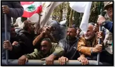 Tear gas  clashes as retired soldiers storm govt hq in lebanon during protest for better pay