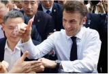 Huge crowds greet macron at china varsity